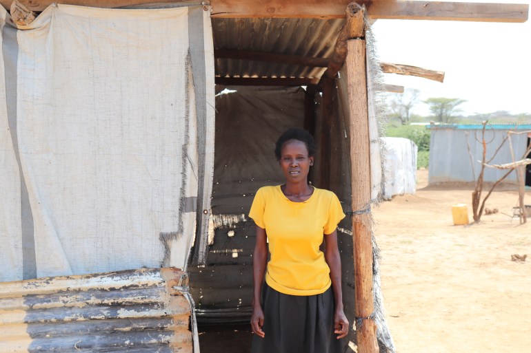 Regina Kusele, a member of Njemps stands outside a makeshift school building that houses over 60 people in Kiwanja Ndege village in Marigat, Baringo Region of Kenya.