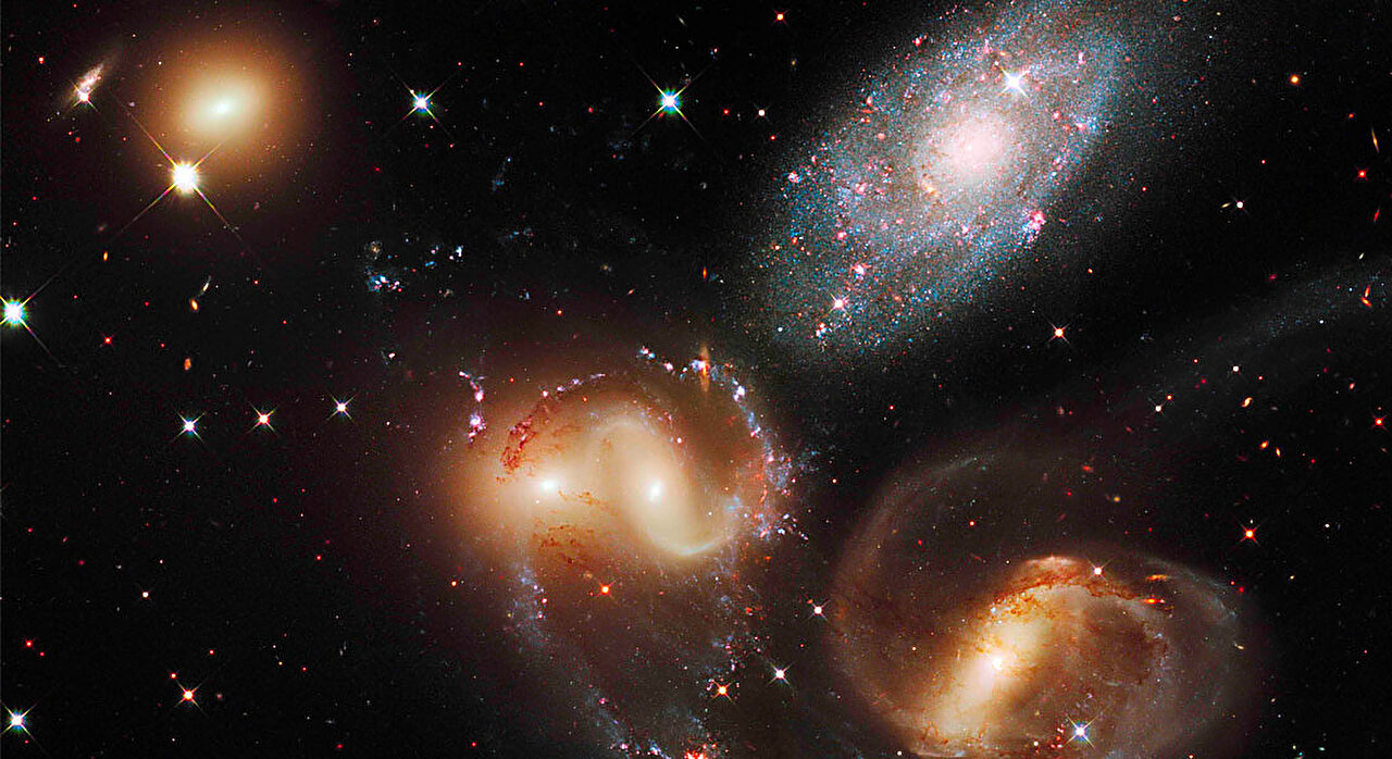 A team of astronomers is investigating a group of galaxies in the early universe