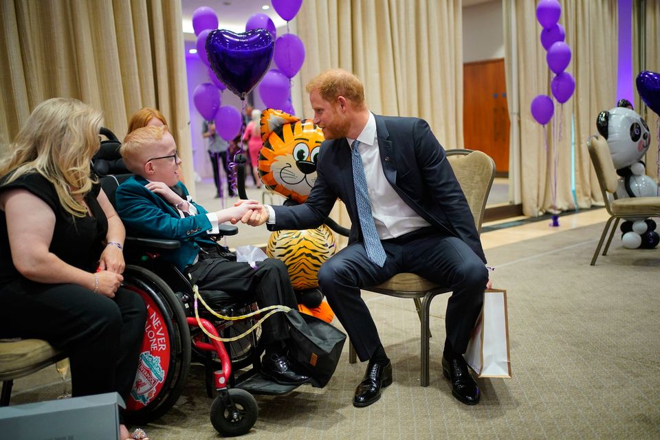 The Duke of Sussex speaks to Blake McCaughey during the 2023 WellChild Awards at the Hurlingham Club in London.  Photo by Yui Mok/PA Wire.