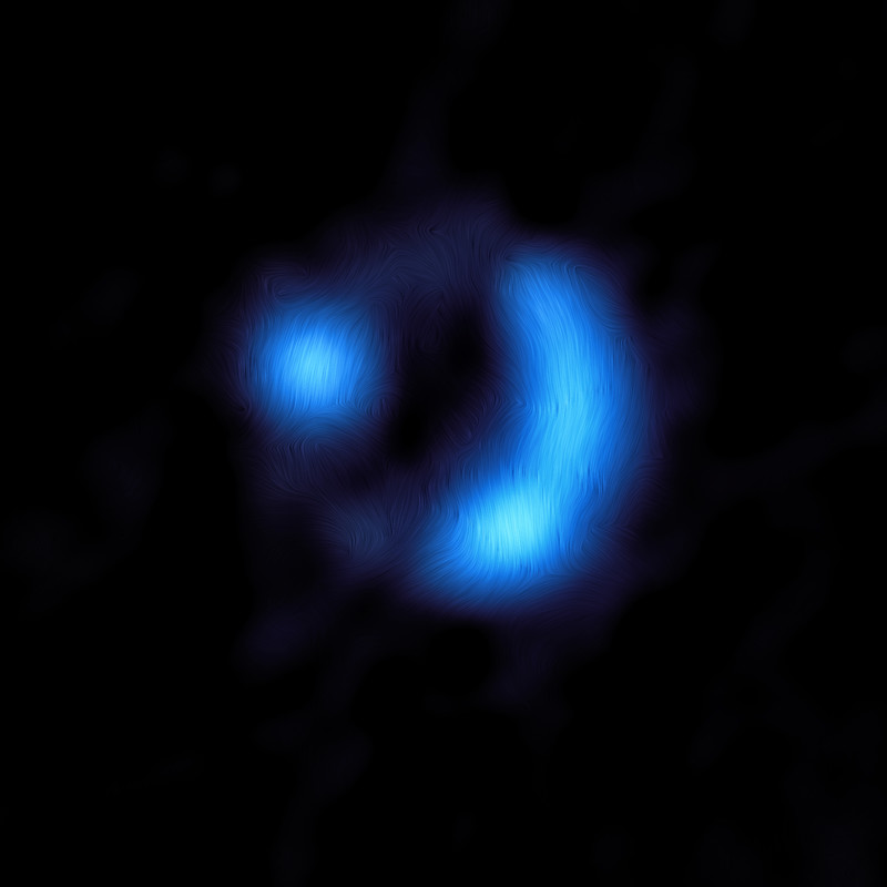 Galactic magnetic field: An incomplete ring of blue wavy light with 2 bright spots along the ring.